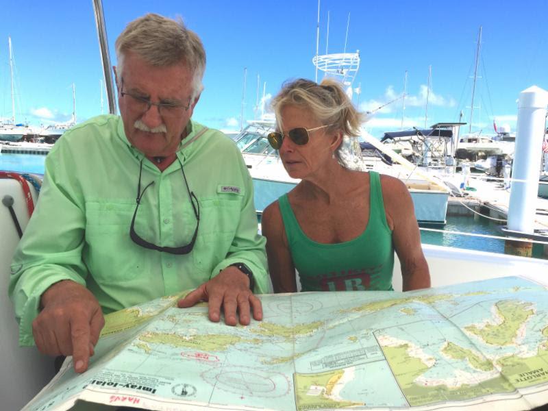 Neil Harvey on John Cook's Beneteau Cyclades 50 Tatonka studies the course for Tuesday's new Full Moon Race - photo © BVI Spring Regatta & Sailing Festival