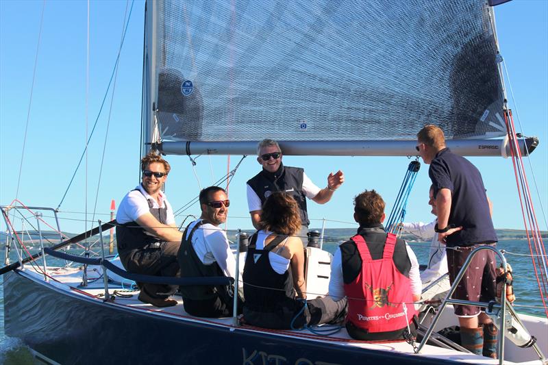 Royal Lymington Yacht Club sailors briefing before a Spring Series race - photo © RLymYC