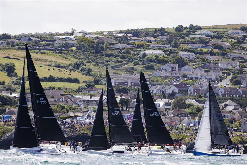 Aurelia (left) entered by Chris Power Smith competing for the Royal St. George Yacht Club leads a group of boats at the start of the SSE Renewables Round Ireland Race photo copyright David Branigan / Oceansport taken at Wicklow Sailing Club and featuring the IRC class