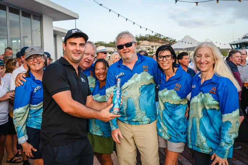 La Quinta crew collecting a prize from The Yacht Sales Co's Peter Austin - SeaLink Magnetic Island Race Week 2024 photo copyright Revolution Productions, SMIRW taken at Townsville Yacht Club and featuring the IRC class