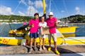 Renan Le Penven and Thierry Roger of Perros-Guirec (FRA) receive a warm welcome and GTA goodie bag from Zara Tremlett, Camper & Nicholsons Port Louis Marina