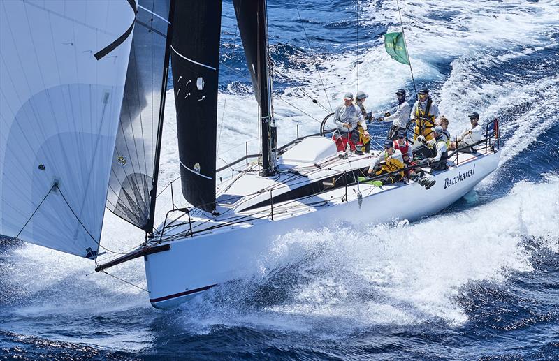 Bacchanal zipping downwind after last year's start photo copyright Carlo Borlenghi / ROLEX taken at Cruising Yacht Club of Australia and featuring the IRC class