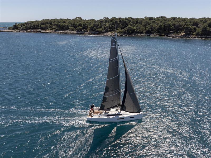 Jeanneau Sun Odyssey 350 with fat head main on a reach photo copyright Gilles Martin-Raget taken at  and featuring the Jeanneau class