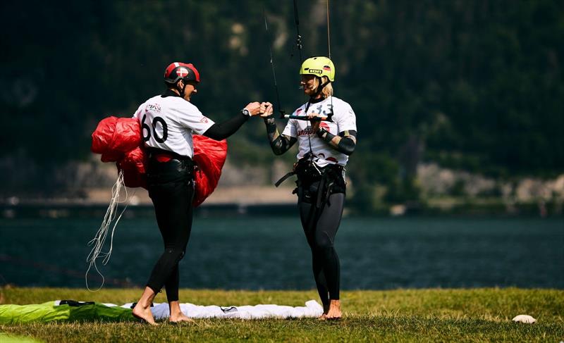 Fist bump between Johan Beckett (DEN) and Jannis Maus (GER) - 2022 KiteFoil World Series Traunsee, Day 2 - photo © IKA Media / Robert Hajduk