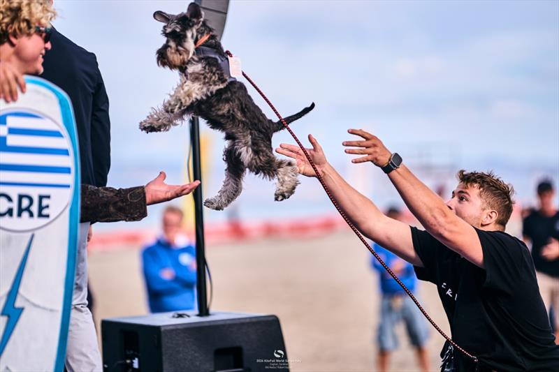 Cameron Maramenides forgot his dog for the podium (no animals were harmed in the making of this photo) - 2024 KiteFoil World Series Sardinia - photo © IKA Media / Robert Hajduk