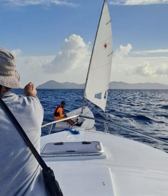 Horizon Yachts Bry Mascoll offering advice in the Bequia Channel photo copyright Jenny Trumble taken at  and featuring the ILCA 4 class