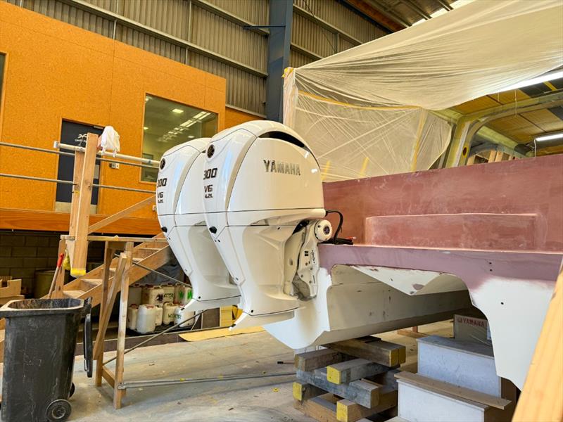 Test fitting the motors - a very exciting stage of the build. Catalyst GT - Lloyd Stevenson Boatbuilders - June 2024 - photo © LSB