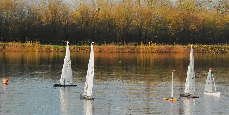 Brass Monkey Christmas race at Abbey Meads - the leading boats in both fleets, Phil Holliday 12, Stollery's 39 & 139 with Mike Wilkie 995 neck and neck with Roger 2. (our total scores also tied!) photo copyright Roger Stollery taken at Guildford Model Yacht Club and featuring the Marblehead class