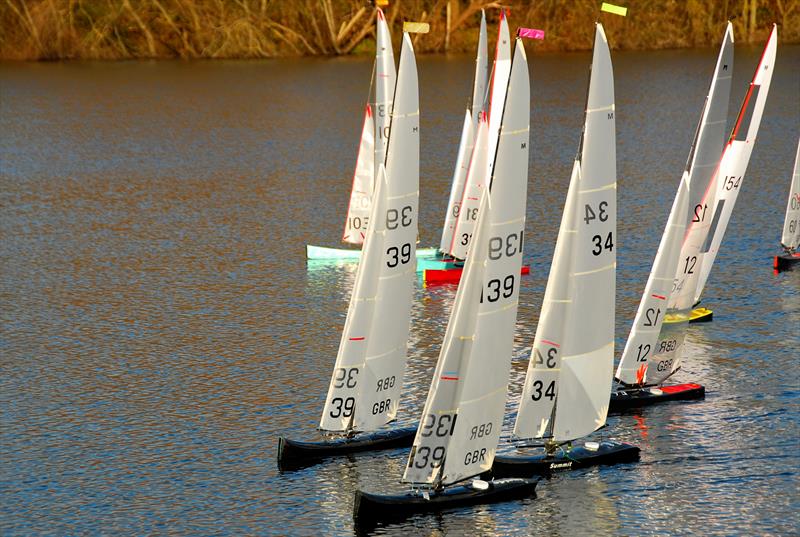 Brass Monkey Christmas race at Abbey Meads - an early start with the leading boats, Barrie Martin 103, Peter & Oliver Stollery 39 and 139 setting the scene for the event photo copyright Roger Stollery taken at Guildford Model Yacht Club and featuring the Marblehead class