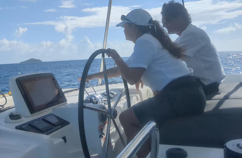 Youth Yachting Program - Paige at the wheel, with Head Instructor Thor - photo © SVG Sailing Association