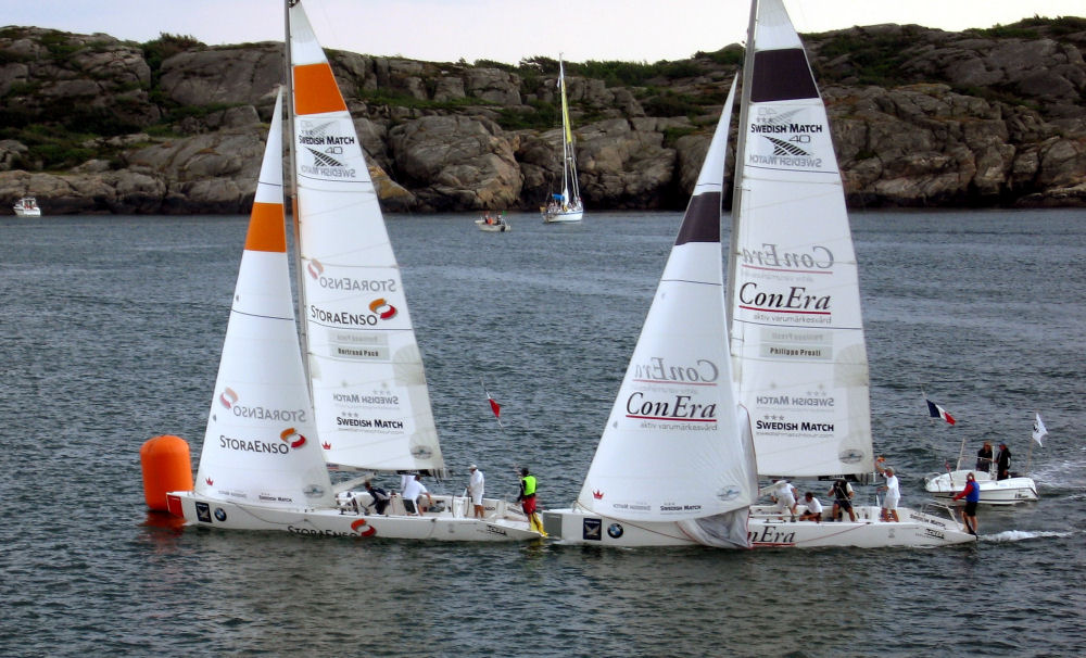 Philippe Presti (right) is hot on the transom of countryman Bertrand Pacé on day one of the Swedish Match Cup photo copyright Swedish Match Tour / Sean McNeill taken at  and featuring the Match Racing class