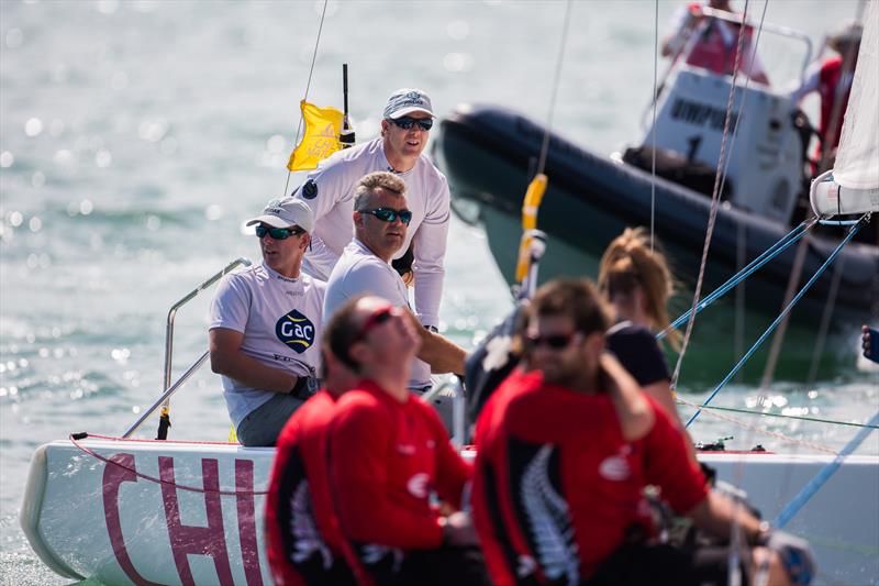 Ian Williams heads through to the Quarter-Finals on day 3 of the Chicago Match Cup 2013 photo copyright Brian Carlin / AWMRT taken at Chicago Match Race Center and featuring the Match Racing class