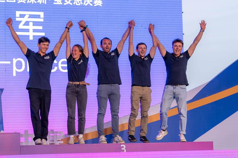 Aurélien Pierroz (FRA) Match Again by Normandy Elite Team with crew Clément Michel, Sébastien Riot, Aurélien Barthelémy, and Lola Billy celebrating on the podium - World Match Racing Tour Shenzhen Bao'an Final 2024 photo copyright Ian Roman / WMRT taken at  and featuring the Match Racing class