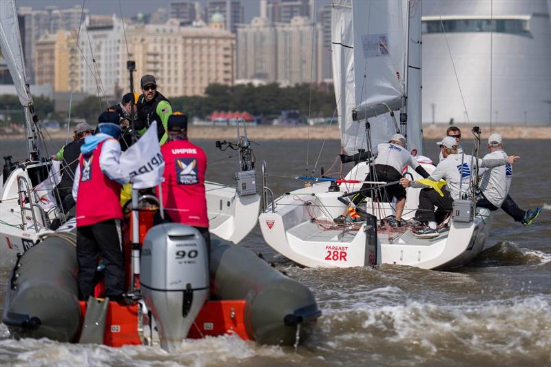 Contact between Ian Williams, GBR/ Pindar by Manuport Logistics and USA's Chris Poole/ Riptide Racing - Macao Match Cup day 3 photo copyright Ian Roman / WMRT taken at  and featuring the Match Racing class