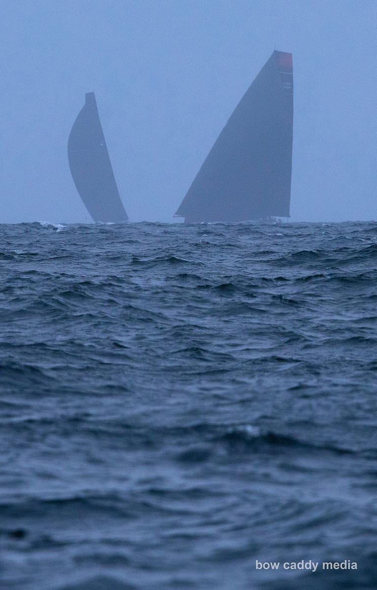 Looming through the mist - Master Lock Comanche and LawConnect photo copyright Bow Caddy Media taken at Cruising Yacht Club of Australia and featuring the Maxi class