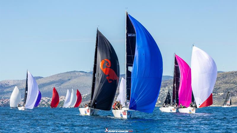 Two six-member teams - The Pimp CRO358 and Sitting Duck SWE508 in front of the pack at the Melges 24 European Championship 2024 in Split, Croatia photo copyright IM24CA / Zerogradinord taken at  and featuring the Melges 24 class