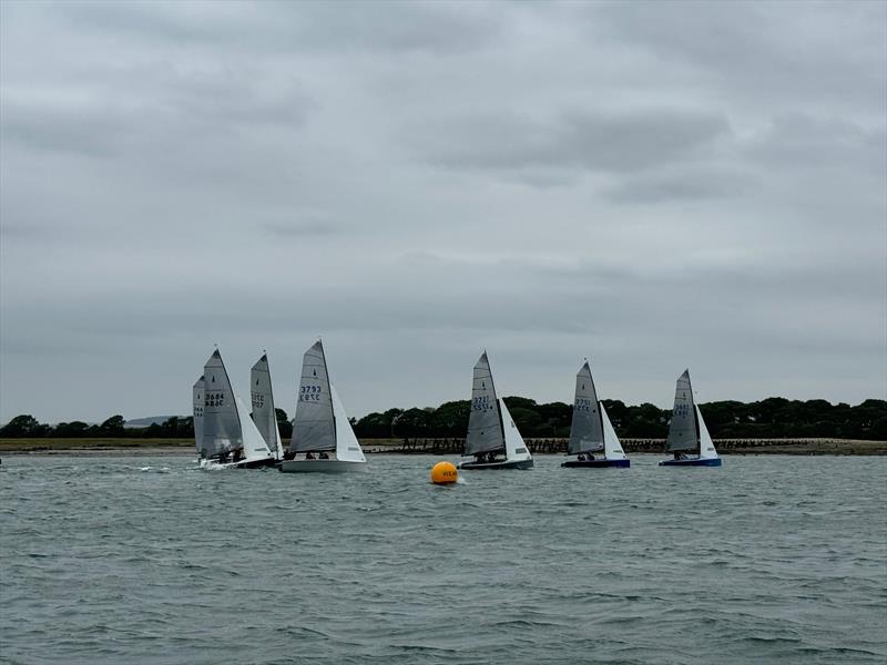 Close racing at the Merlin Rocket Youth Championship at Itchenor Sailing Club photo copyright Sophie Yeoman taken at Itchenor Sailing Club and featuring the Merlin Rocket class