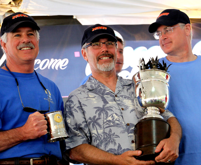 Bill Gibbs with his trophy for fastest corrected time on Afterburner during the 66th Newport to Ensenada Regatta photo copyright Rich Roberts taken at 