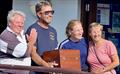 Cardigan Bay Regatta at New Quay: Overall winners, Brainstorm – Chris Seal (l) Roma Kearns and Debbie Johnson (Justin Davies gone to the bar!) - Melrose Trophy presented by Huw Williams (RNLI) © Rees Tom Jones, Martyn Johnson, Fiona Lloyd Evans, Chris Seal