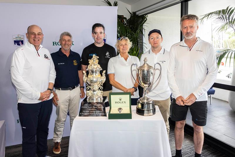 The panelists standing around the Overall winner trophy, Rolex timepiece and Line Honours trophy (left to right). Panelists from left to right: Matt Allen, Peter Bremner, Sebastian Bohm, Wendy Tuck, Phillip Kurts and Christian Beck  - photo © CYCA  | Andrea Francolini