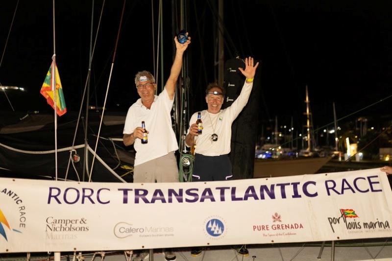 Patrick Isoard and François Moriceau - Uship-Pour Enfants du Mekong (FRA) are welcomed into Grenada  photo copyright Arthur Daniel / RORC taken at Royal Ocean Racing Club