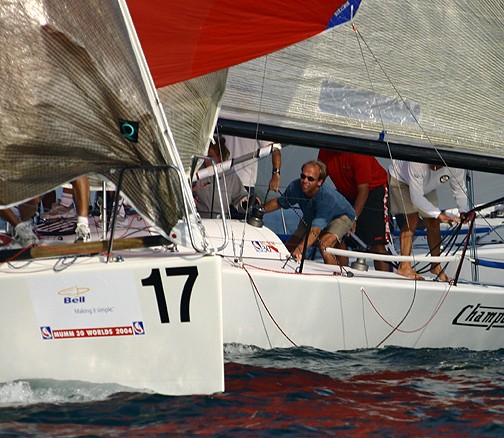 Jonathan McDonagh's Champosa from Minneapolis takes the stern of Kevin Brown's Notorious, Toronto, at the leeward mark during the Bell Mumm 30 Worlds photo copyright Rich Roberts taken at Royal Canadian Yacht Club and featuring the  class