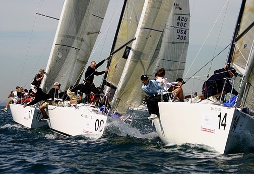 From left, Richard Swann's Cygnet, David Gonzalez' Three Niner and Jim Sminchak's it prepare their spinnaker hoists on the offset leg at the Mumm 30 worlds in Toronto photo copyright Rich Roberts taken at Royal Canadian Yacht Club and featuring the  class