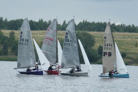 Close racing in the first race of the Gill Summer Event at Leigh & Lowton photo copyright Brian Herring taken at Leigh & Lowton Sailing Club and featuring the National 12 class