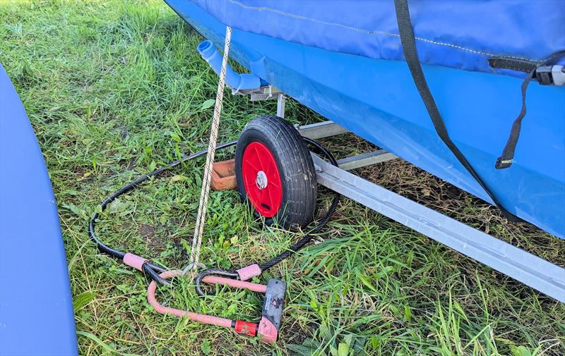 A well secured dinghy, tied to the ground and trolley locked - photo © Mark Jardine