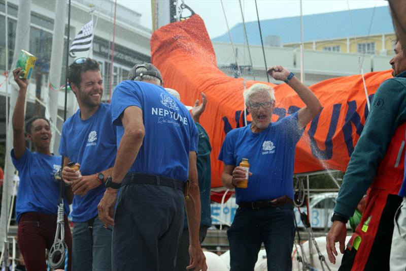 Neptune crew member Bertrand Delhom enjoying a champagne shower - photo © OGR2023 / Marco Ausderau