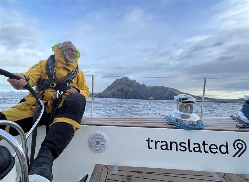 Co-skipper Marco Trombetti loving life as he helms within 0.5 miles off Cape Horn - photo © Translated 9 / OGR2023