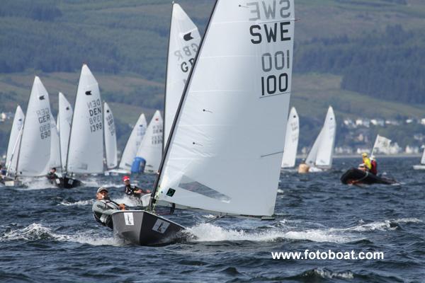 Thomas Hansson Mild leads the fleet at the OK World Championships photo copyright Alan Henderson / www.fotoboat.com taken at Largs Sailing Club and featuring the OK class