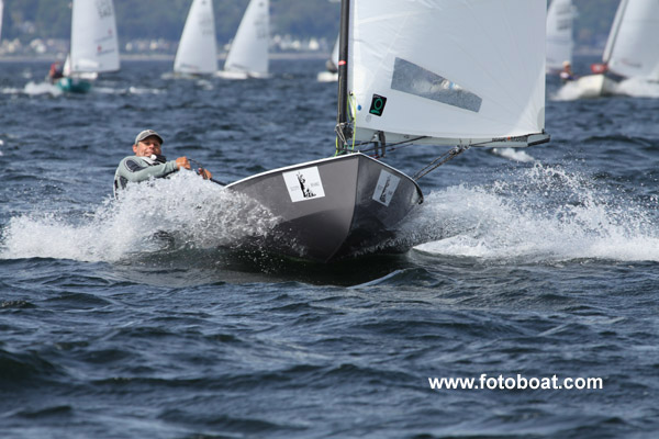 Thomas Hansson-Mild at the 2011 International OK Dinghy World Championships photo copyright Alan Henderson / www.fotoboat.com taken at Largs Sailing Club and featuring the OK class