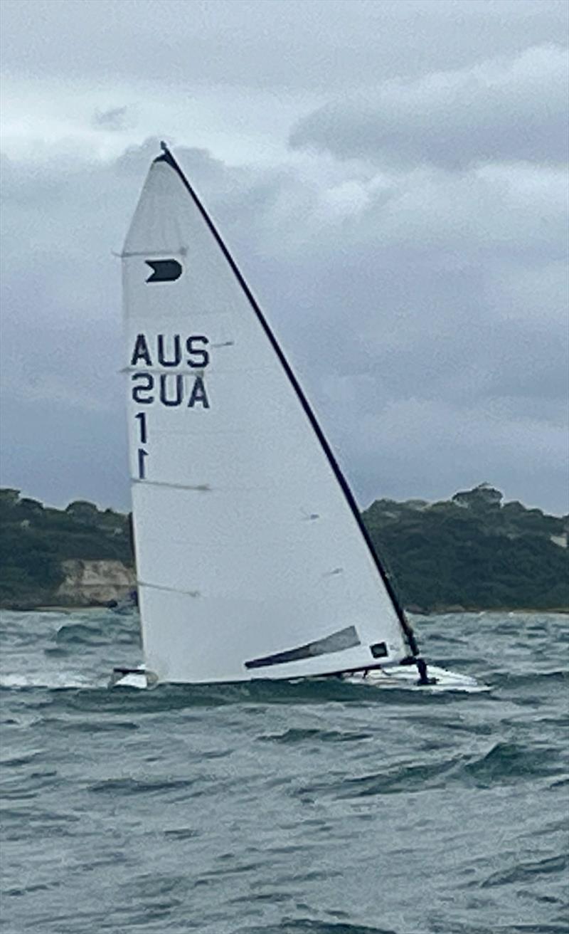 Roger Blassé Powering in 20 knots. 2025 OK Australian Championships photo copyright Nik Wallis taken at Black Rock Yacht Club, Australia and featuring the OK class