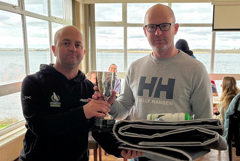 Nathan Batchelor of Ovington presents trophy to Andy Davis - OK Inland Championship at Grafham photo copyright Karen Robertson taken at Grafham Water Sailing Club and featuring the OK class