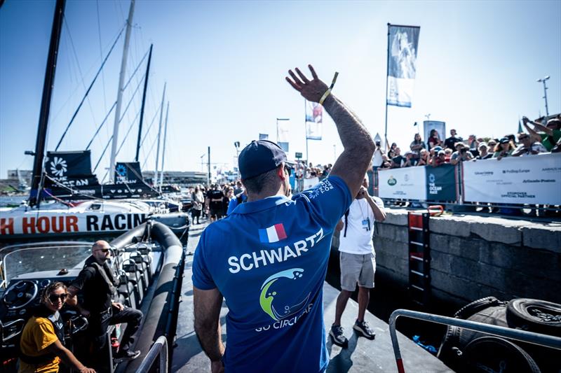 The Ocean Race Leg 6 start day onboard Team Holcim - PRB. Benjamin Schwartz waves to the enthusiastic crowd during the sailors parade - photo © Georgia Schofield / polaRYSE / Holcim-PRB