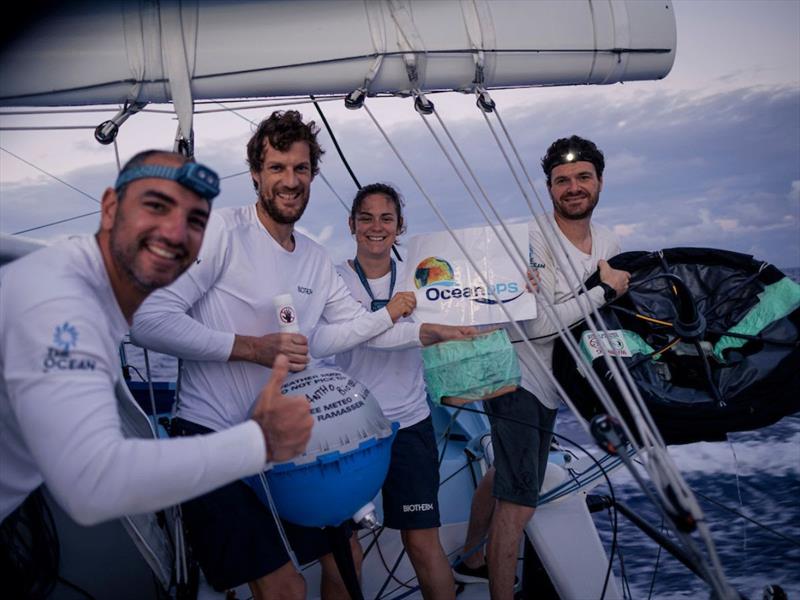 Biotherm team with a buoy for collecting Real-Time Marine Weather Data during The Ocean Race - photo © Anne Beaugé / Biotherm / The Ocean Race