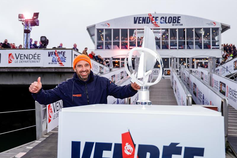 10th Vendée Globe departure - thumbs up from Sébastien Marsset as he passes the trophy - photo © Anne Beaugé / Alea