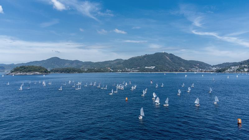 Kata Bay and the Opti fleet. Phuket King's Cup Regatta 2024 photo copyright Guy Nowell / Phuket King's Cup taken at Royal Varuna Yacht Club and featuring the Optimist class