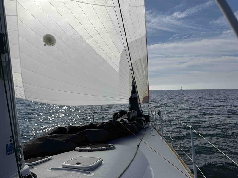 Full kites and smiling faces aboard Jonathan and Libby McKee's Riptide 44, Dark Star photo copyright David Schmidt taken at Corinthian Yacht Club of Seattle and featuring the ORC class