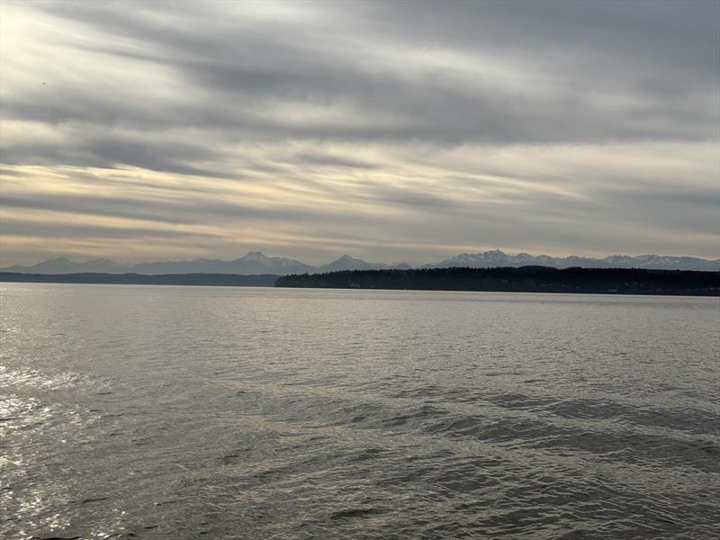 Early stage sunset over the Olympic Mountains photo copyright David Schmidt taken at Corinthian Yacht Club of Seattle and featuring the ORC class