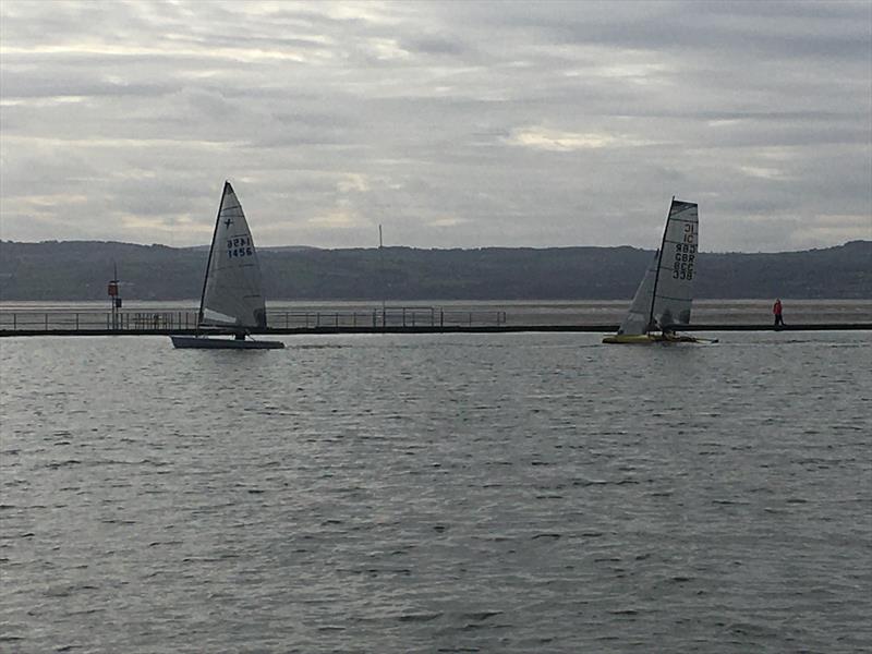 Steve Fleming in his IC chasing Andrew Potter in his Phantom during West Kirby Sailing Club Frostbite Series Day 1 photo copyright Liz Potter taken at West Kirby Sailing Club and featuring the Phantom class