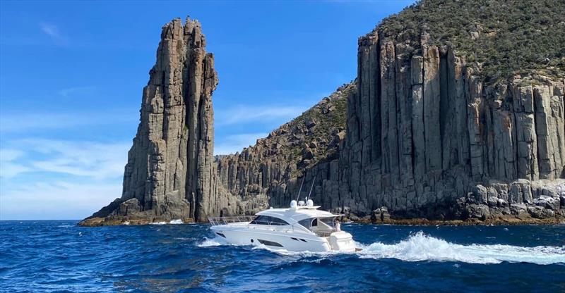 Cape Pillar near Port Arthur provides a spectacular background for Dory as she cuts through the swell photo copyright Riviera Australia taken at  and featuring the Power boat class