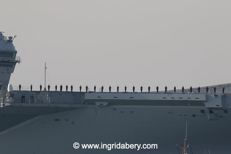 HMS Queen Elizabeth's salute exchange with the Royal Yacht Squadron - photo © Ingrid Abery / www.ingridabery.com