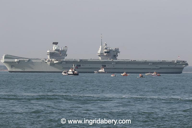 HMS Queen Elizabeth's salute exchange with the Royal Yacht Squadron - photo © Ingrid Abery / www.ingridabery.com