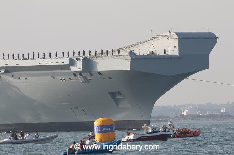 HMS Queen Elizabeth's salute exchange with the Royal Yacht Squadron - photo © Ingrid Abery / www.ingridabery.com