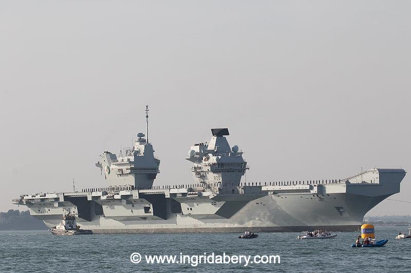 HMS Queen Elizabeth's salute exchange with the Royal Yacht Squadron - photo © Ingrid Abery / www.ingridabery.com