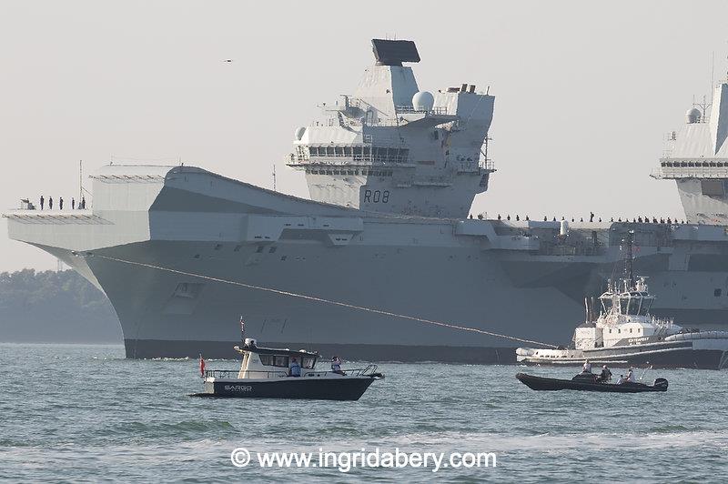 HMS Queen Elizabeth's salute exchange with the Royal Yacht Squadron - photo © Ingrid Abery / www.ingridabery.com