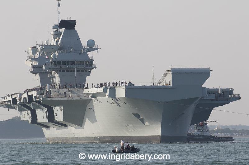 HMS Queen Elizabeth's salute exchange with the Royal Yacht Squadron - photo © Ingrid Abery / www.ingridabery.com