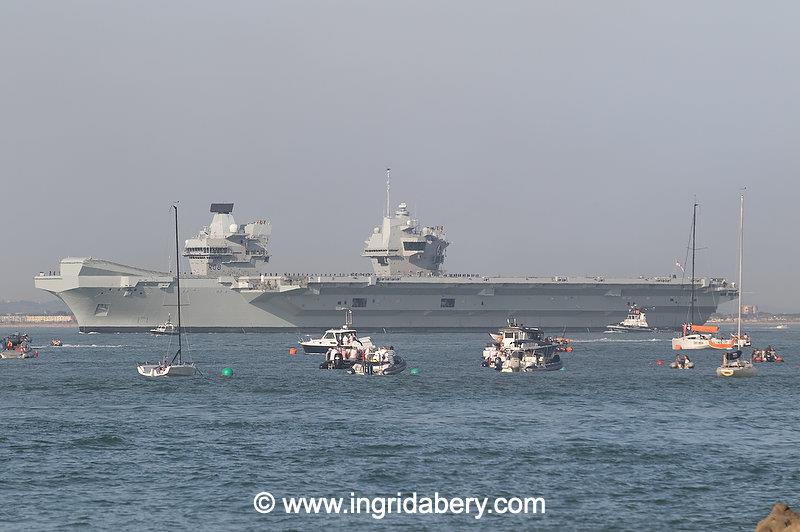 HMS Queen Elizabeth's salute exchange with the Royal Yacht Squadron - photo © Ingrid Abery / www.ingridabery.com